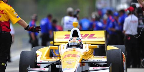 Helio Castroneves captured the pole for Sunday's IndyCar race. He narrowly beat James Hinchcliffe for the the top spot.