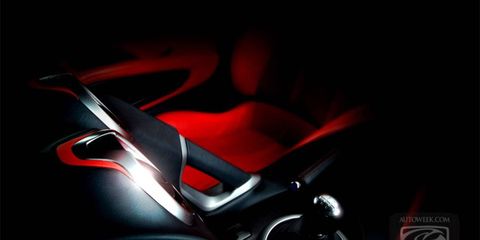 You can see the red seats and the chunky shifter in this latest teaser shot of the Viper.