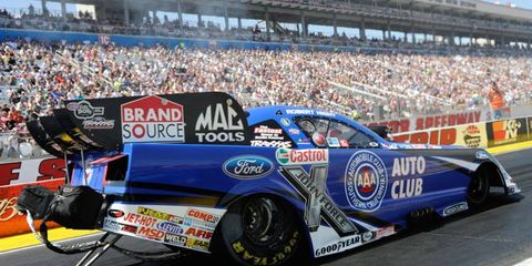 Robert Hight topped Bob Tasca III in the Funny Car final on Sunday in Las Vegas.
