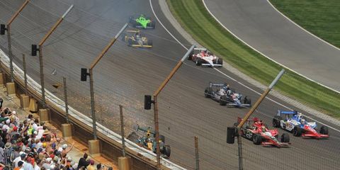 A scene from last year's Indy 500 shows Indy driver E.J. Viso's crash. This season, organizers are hoping for another great race.