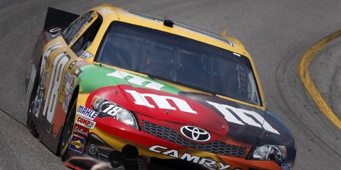 Kyle Busch spoiled Dale Earnhardt Jr.'s bid for his first victory in four years, winning the NASCAR Sprint Cup race at Richmond.