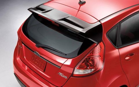 The $20,835 sticker price on our 2012 Ford Fiesta SES Hatchback got us a premium interior package and exterior options&#8212;like a rear spoiler and shiny wheels&#8212;that buyers will either love or hate.