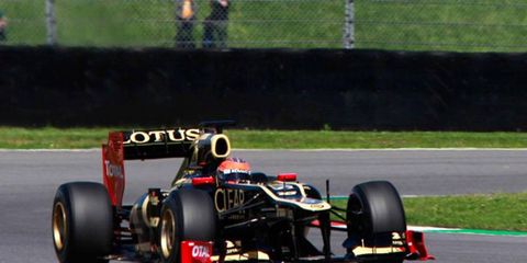 Romain Grosjean drove his Lotus to the top of the charts during the second day of a rare three-day in-season test session on Wednesday.