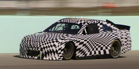 The SS name will be used on a Chevrolet rear-wheel-drive performance sedan and a NASCAR Sprint Cup entry. A racing prototype is shown.