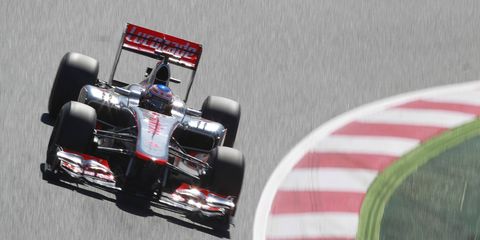 Slippery track conditions didn't stop Jenson Button on Friday morning as he was the fastest driver in the final practice for the Spanish Grand Prix.