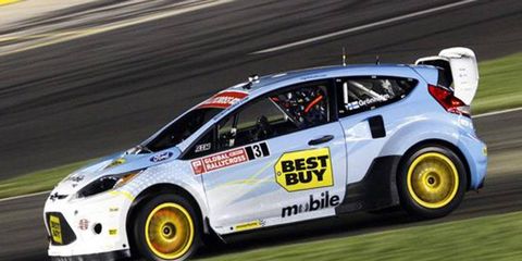Marcus Gr&ouml;nholm took the lead on the first turn of the first lap and won the Global RallyCross event at Charlotte Motor Speedway on Saturday night.