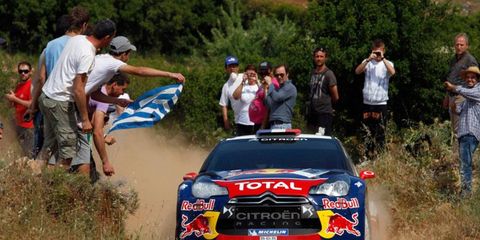 S&eacute;bastien Loeb rolls through the countryside in Greece on Saturday.