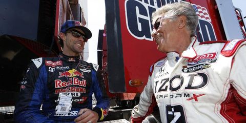 Racing icon Mario Andretti talks with up-and-comer Travis Pastrana. Andretti was recently appointed the PR ambassador of the Circuit of the Americas.