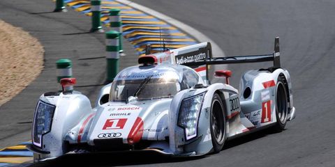 Andre Lotterer, Benoit Treluyer and Marcel Fassler led the 24 Hours of Le Mans by a lap at the one-third mark.