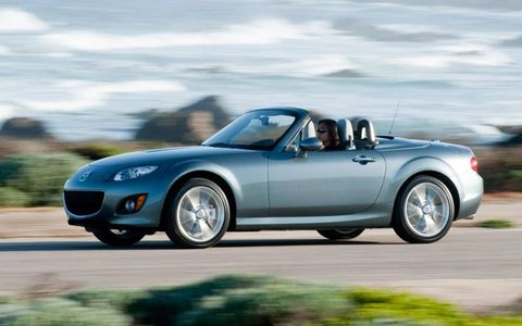 With its well-sorted chassis, communicative suspension and solid construction, the 2012 Mazda MX-5 Miata PRHT roadster is a riot to drive.