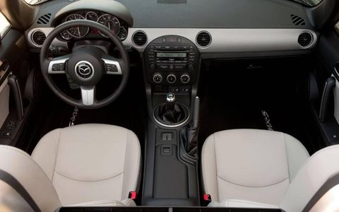 The cabin of the 2012 Mazda MX-5 Miata PRHT is as tight as ever, and there's not a ton of cargo room out back--clearly, the focus of this roadster is the driving experience.
