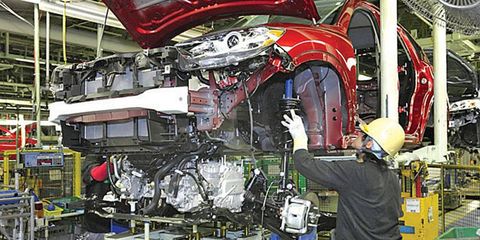 A CX-5, Mazda's first vehicle with the full package of Skyactiv technologies, is assembled in Hiroshima.
