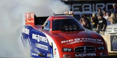 Johnny Gray, above, was the No. 1 qualifier in the Funny Car division on Saturday in NHRA action.