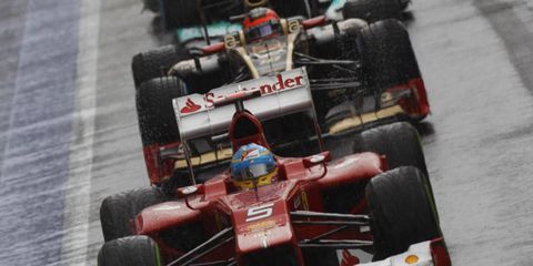 Fernando Alonso took advantage of a wet day at the racetrack on Saturday at Silverstone.