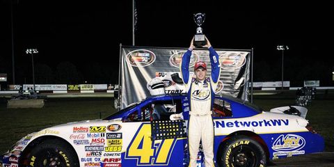 Cale Conley celebrates his first NASCAR victory, a win in the K&N Series at Columbus Motor Speedway.