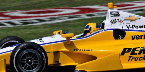 Helio Castroneves injured his hand in a crash during a practice session Saturday morning at Mid-Ohio.