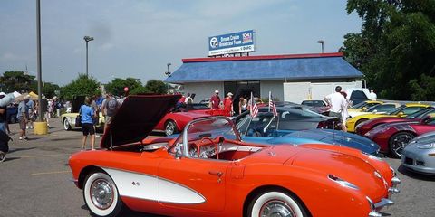 Corvettes coalesce in a parking lot during the Woodward Dream Cruise.
