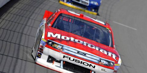 Trevor Bayne, driving in his Wood Brothers Sprint Cup car, will be driving a full schedule of Nationwide races in 2013.