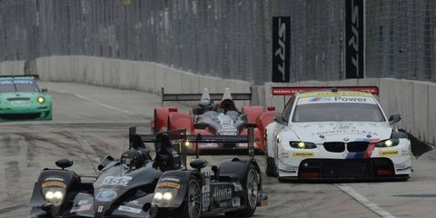 The American Le Mans series, which ran last weekend in Baltimore, will combine with the rival Grand-Am series.