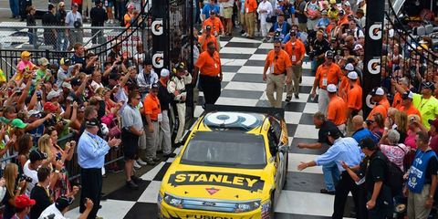 Marcos Ambrose, shown winning earlier this year in Watkins Glen, will be exchanging team personnel with Richard Petty Motorsports teammate Aric Almarola for the rest of the season.