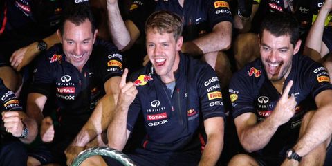 Sebastian Vettel and the Red Bull team celebrate Vettel's second Formula One win of 2012.