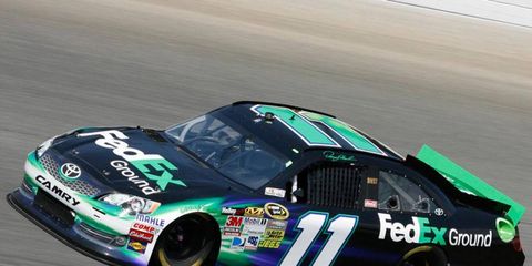 Denny Hamlin was quickest in Friday practice at Loudon.