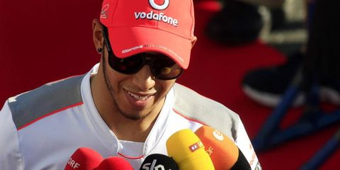 Lewis Hamilton, shown talking to the media in Japan, said his decision to move to Mercedes was not an easy one.