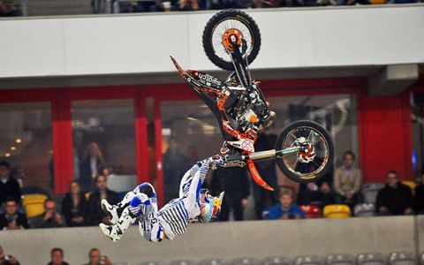 Flipping Out: Red Bull Freestyle Motocross star Mat Rebeaud from Switzerland flips for the crowd at the 2010 Race of Champions in Dusseldorf, Germany.