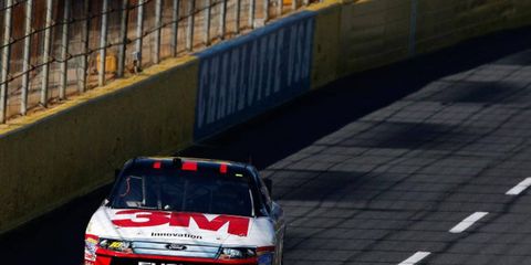 Greg Biffle broke a seven-year-old track record with his qualifying lap at Charlotte on Thursday night.
