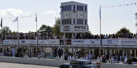 A vintage Jaguar passes the pits at the Goodwood circuit during the Goodwood Revival in September. The track looks much the way it did when it last staged an "official" race in the 1960s.