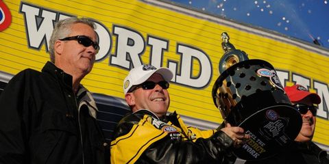 Allen Johnson, 52, clinched the NHRA Pro Stock points championship on Saturday in Pomona.