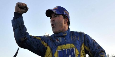 Ron Capps, in a close battle with Jack Beckman for the NHRA Funny Car season championship, reacts after earning the top seed for Sunday's eliminations at Pomona.