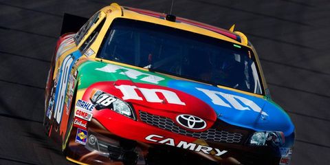 Kyle Busch set a track record at Phoenix of 138.788 mph in qualifying on Saturday.