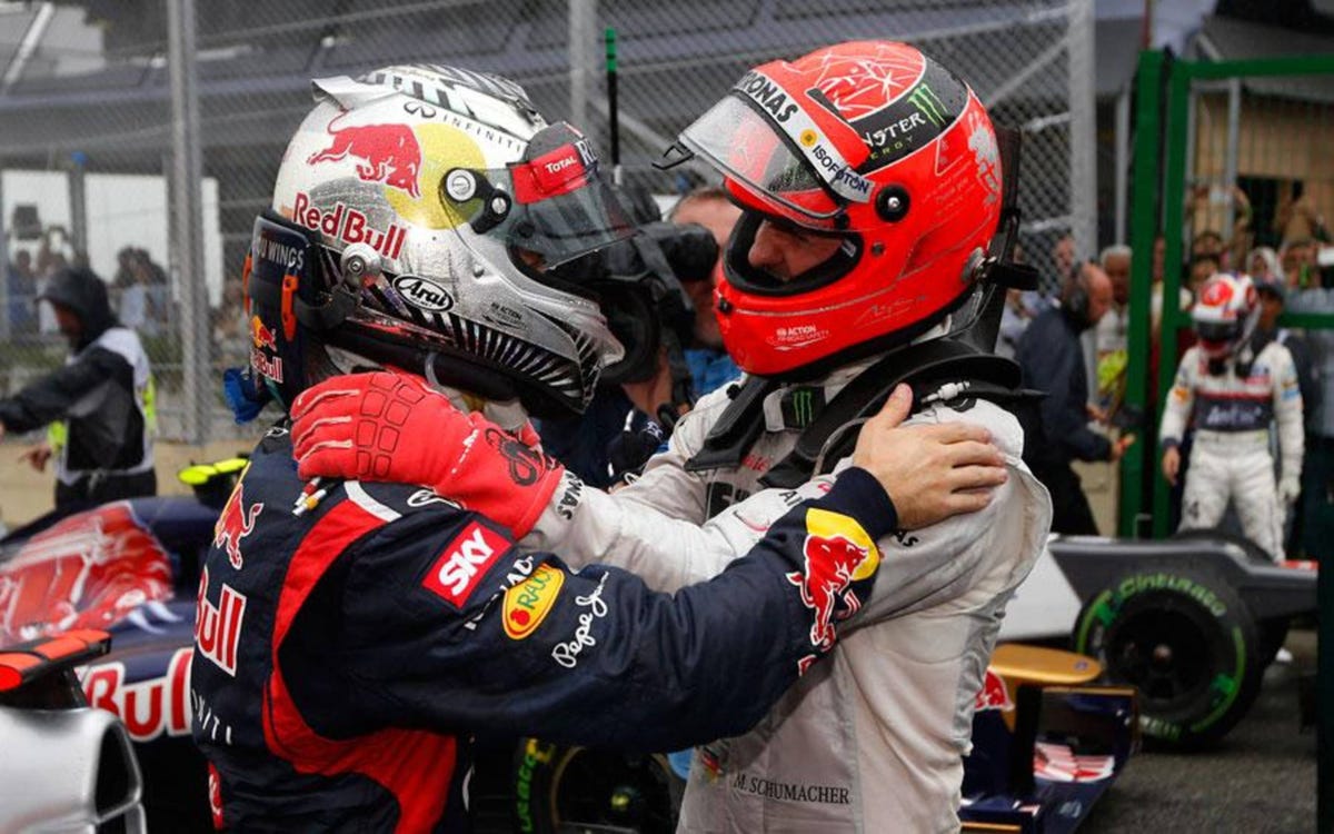 Vettel youngest three-time F1 champ; Button wins Brazilian Grand Prix