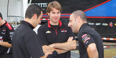 Will Power, center, chats with teammate Helio Castroneves, left, and Tony Kanaan at Sebring on Wednesday.