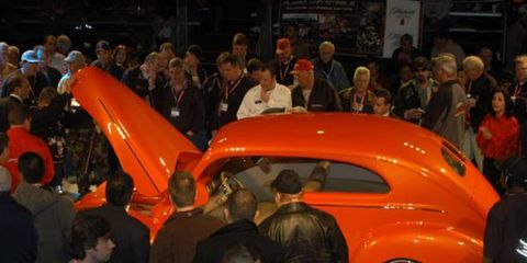 Bidders take a look at a hot rod as it crosses the Russo and Steele auction block in Scottsdale, Arizona.