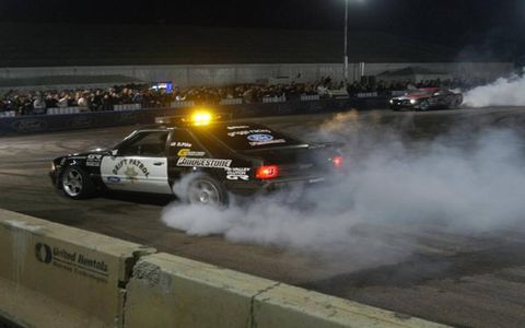 Not your typical police car - drifting Mustangs at Barrett-Jackson
