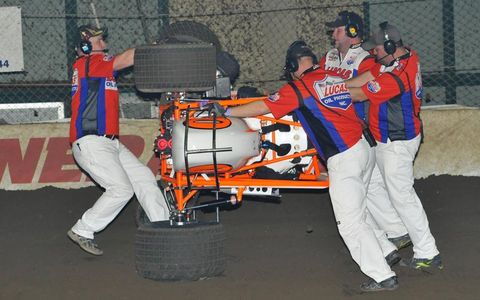 Canada's Glenn Styres shows how sturdy midgets are as he gets pushed back on to four wheels. 2013 Chili Bowl Nationals, Tulsa Expo Raceway, Tulsa, Oklahoma.Photo by Rupert Berrington