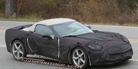 This covered prototype shows the 2014 Chevrolet Corvette Stingray with the convertible top in place.