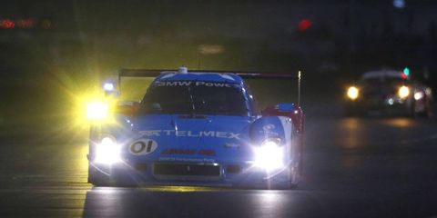 The winners from Chip Ganassi Racing with Felix Sabates roll through the night in the Rolex 24 Hours at Daytona.
