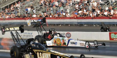Tony Schumacher drove his U.S. Army dragster to the provisional No. 1 spot with a 3.758 second run at 328.14 mph to lead the Top Fuel class.