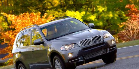 BMW is recalling more than 30,000 of its X5 SUVs built between 2007 and 2010.