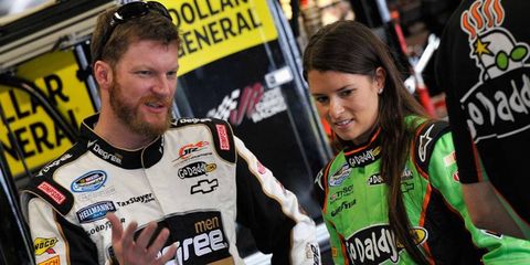Dale Earnhardt Jr., left, has won 10 consecutive NASCAR Most Popular Driver awards. Danica Patrick, right, could take that crown this year.
