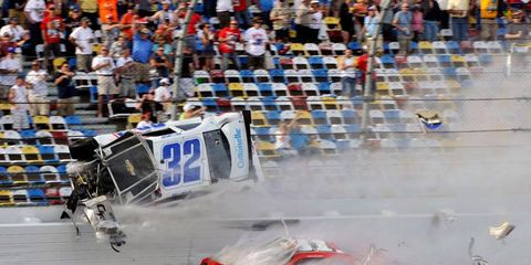 At least 28 people were injured when car parts from a last-lap crash flew into the stands at Daytona International Speedway on Saturday.