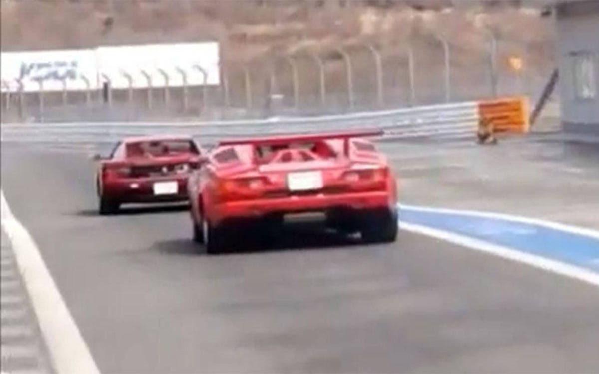 Lamborghini Countach vs. Ferrari Testarossa supercar battle, circa 1991