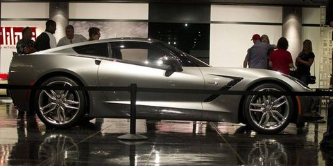 The new Corvette Stingray coupe on display, among history.