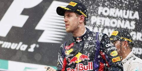 Sebastian Vettel celebrated his win in the Malaysian Grand Prix Sunday. There was a big controversy after Vettel passed teammate Mark Webber in the final laps after being ordered not to.