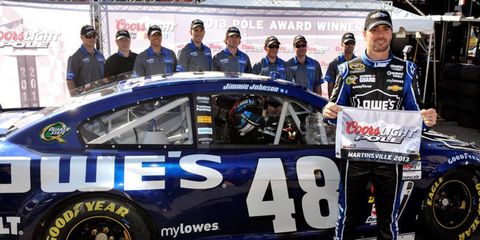 Jimmie Johnson won the pole at Martinsville with a pole-record speed of 98.400 mph on Friday.