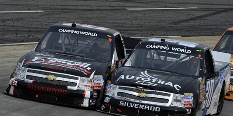 After moving up to the Nationwide Series, Nelson Piquet Jr. will make a trucks appearance at Martinsville. Piquet Jr. is shown battling Joey Coulter last year.