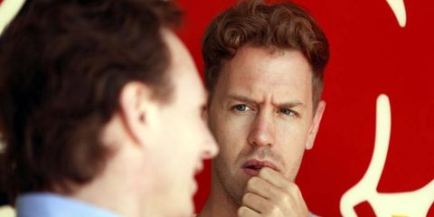 Christian Horner says that there is no power struggle going on within Red Bull Racing with three-time world champion Sebastian Vettel, right.